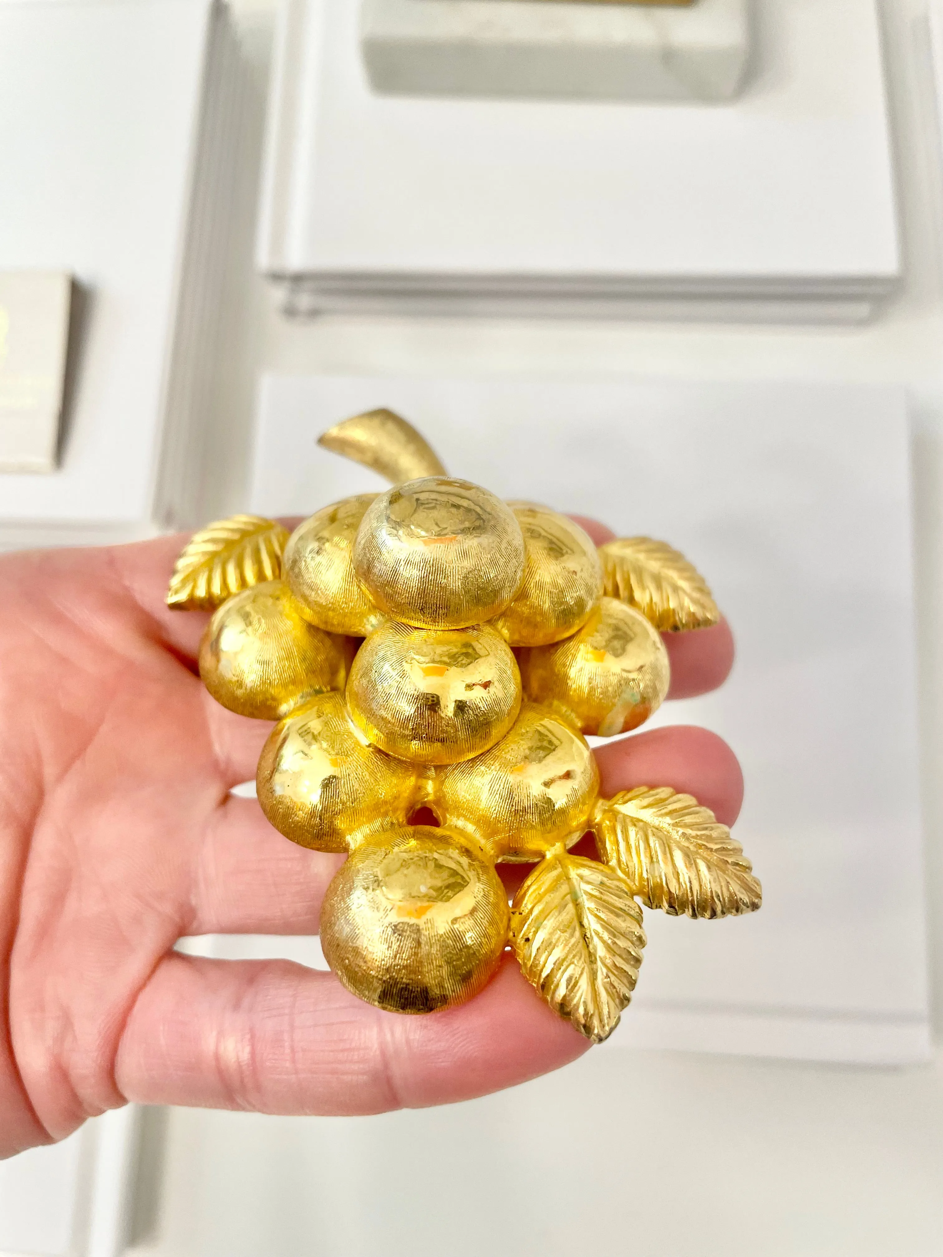 A truly special piece... a rare Judith Leiber heavy gold, sculptural brooch... So chic!