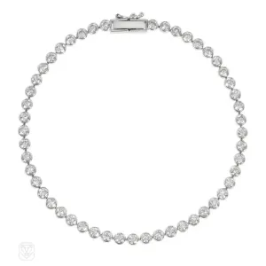 Modern platinum and diamond line bracelet